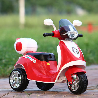 G.W. N.W 6.5 KGS/5.5 KGS Triciclo de desenho animado de cores para bebês com luzes e bateria magníficas